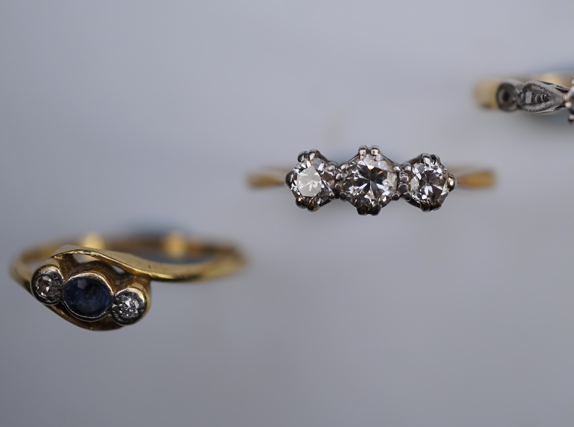 Four gem-set rings
